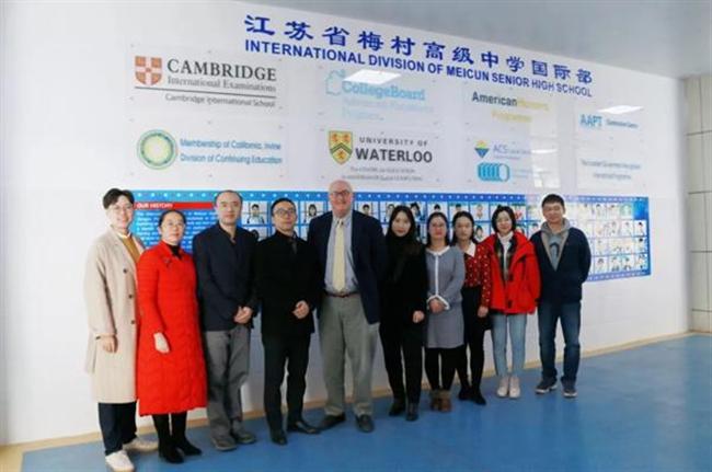 A group of people posing for the camera

Description automatically generated