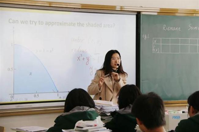 A group of people sitting at a table

Description automatically generated